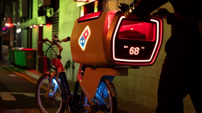 Domino's dxb - The Electric Bike Revolutionizing Pizza Delivery Freshness